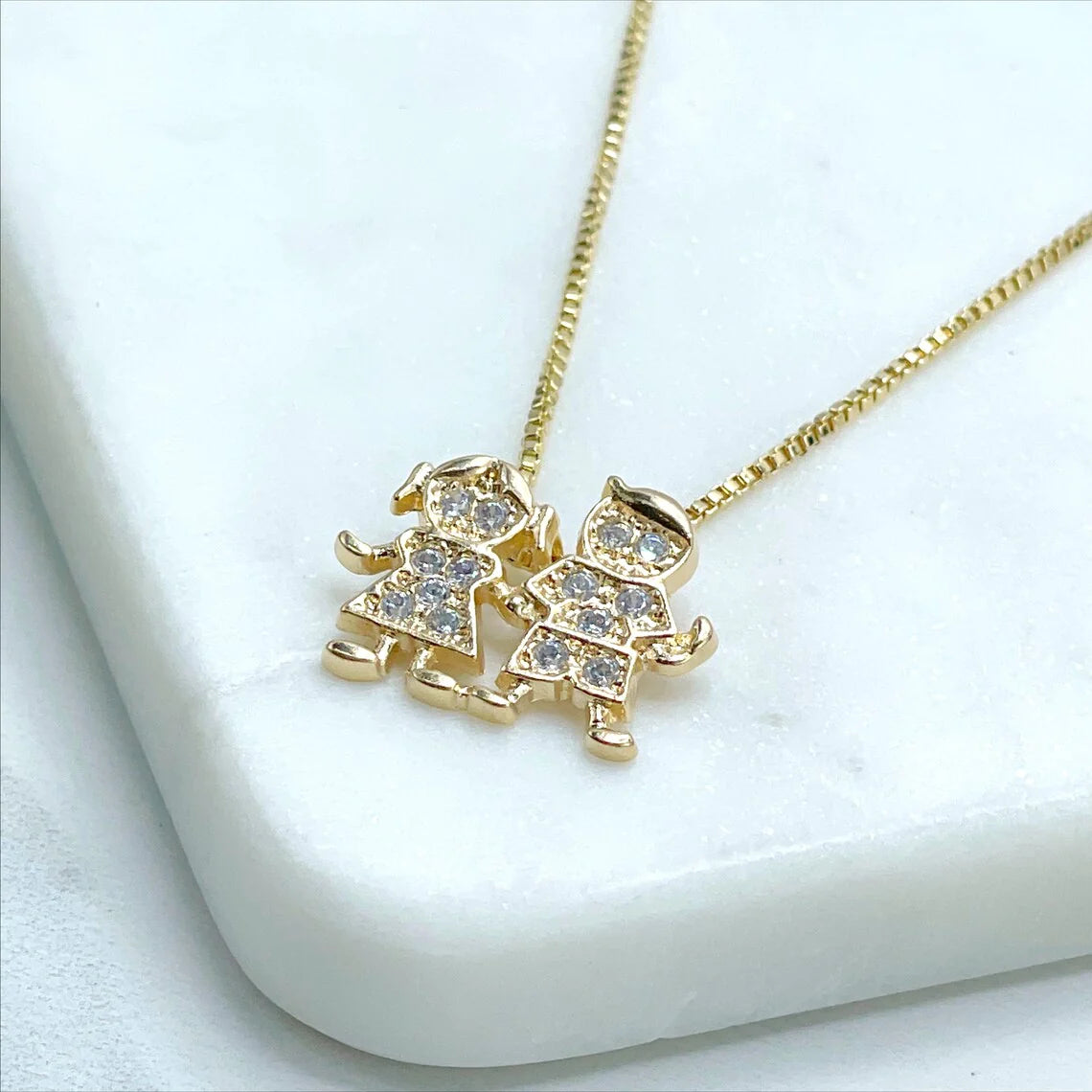 Chain and Pendant Set. Box Link Chain with Boy and Girl Pendant in Cubic Zirconia 18k Gold Filled. Bundle and Save. FREE SHIPPING on orders of $100 and over.  Sam's Jewelry World USA.