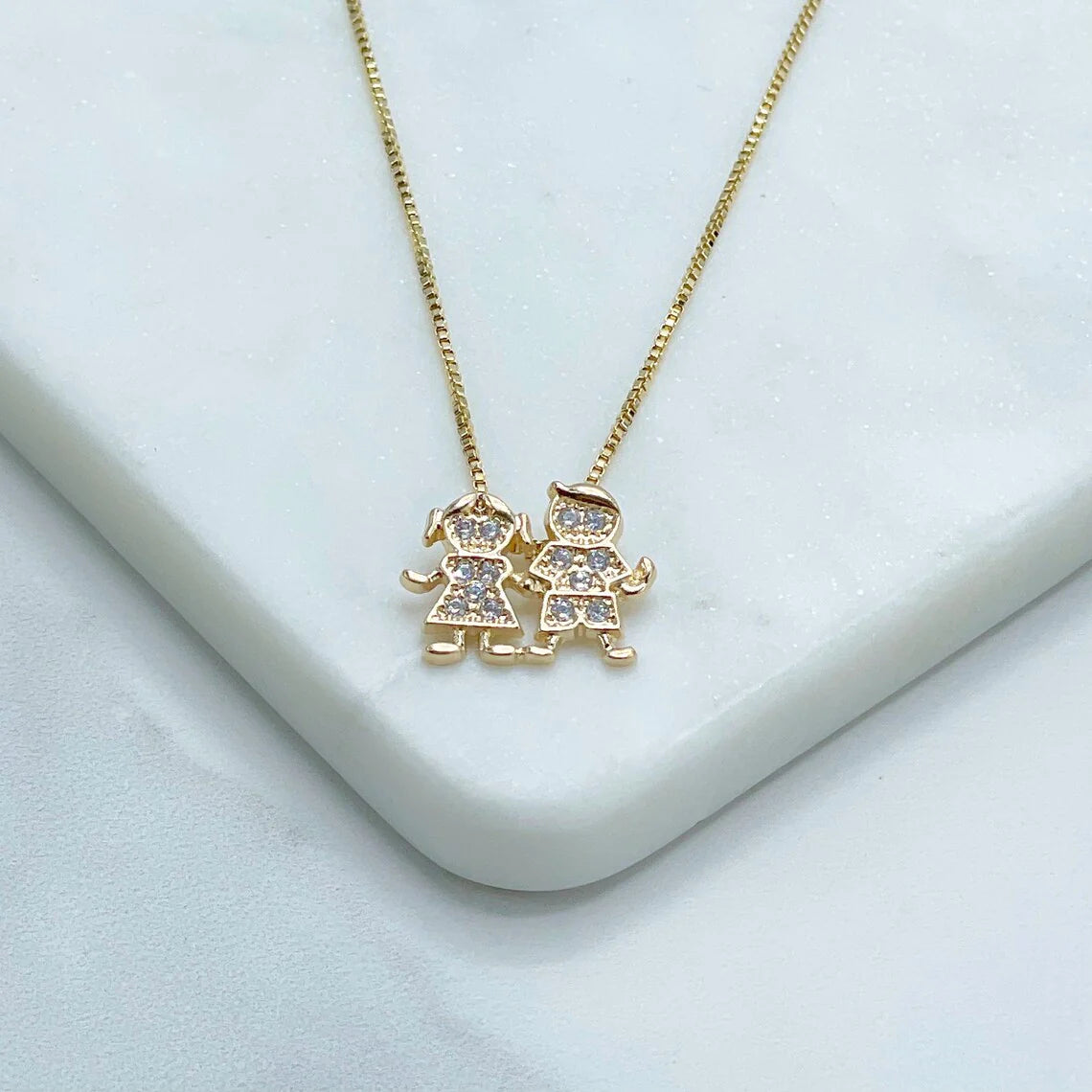 Chain and Pendant Set. Box Link Chain with Boy and Girl Pendant in Cubic Zirconia 18k Gold Filled. Bundle and Save. FREE SHIPPING on orders of $100 and over.  Sam's Jewelry World USA.