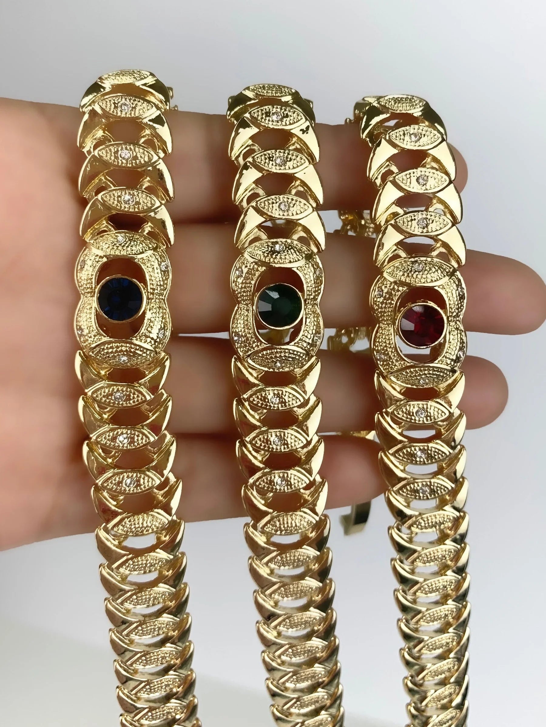 Bracelet Stone Cubic Zirconia. Blue ,Red, or Green Stone, Texturized 18k Gold Filled.  Bundle and Save. FREE SHIPPING on orders of $100 and over. Sam's Jewelry World USA.