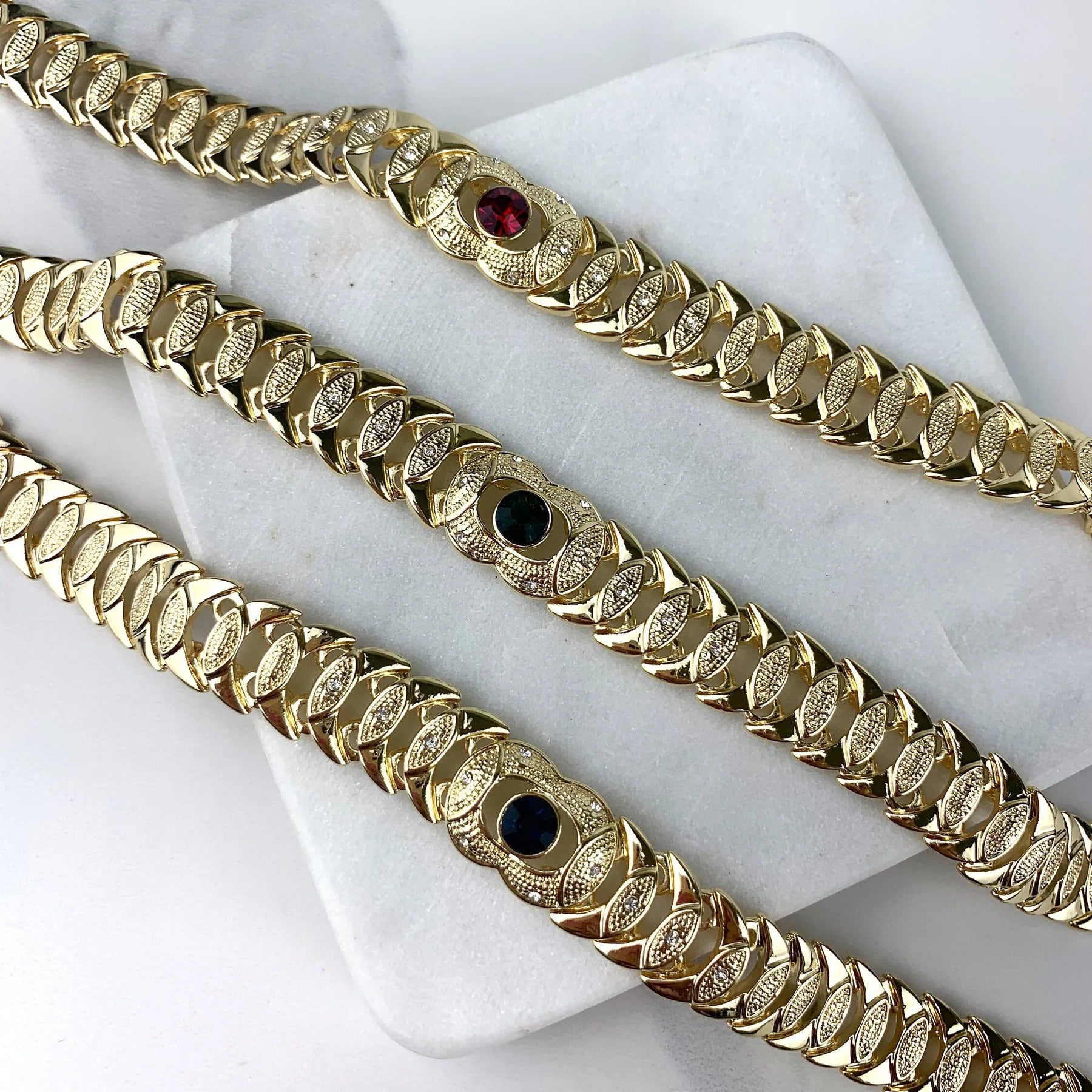 Bracelet Stone Cubic Zirconia. Blue ,Red, or Green Stone, Texturized 18k Gold Filled.  Bundle and Save. FREE SHIPPING on orders of $100 and over. Sam's Jewelry World USA.