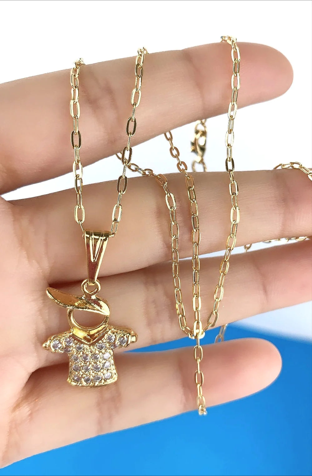 Chain and Pendant Set.  Oval Link Chain with Cubic Zirconia Boy Pendant 18k Gold Filled. Bundle and Save. FREE SHIPPING on orders of $100 and over.  Sam's Jewelry World USA.