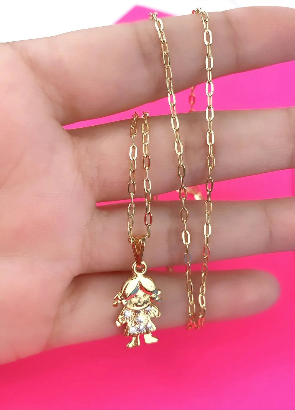 Chain and Pendant Set. Boy or Girl Gold Pendant with Cubic Zirconia Moving Head. Oval Link Chain with 18k Gold Filled. Bundle and Save. FREE SHIPPING on orders of $100 and over.  Sam's Jewelry World USA.