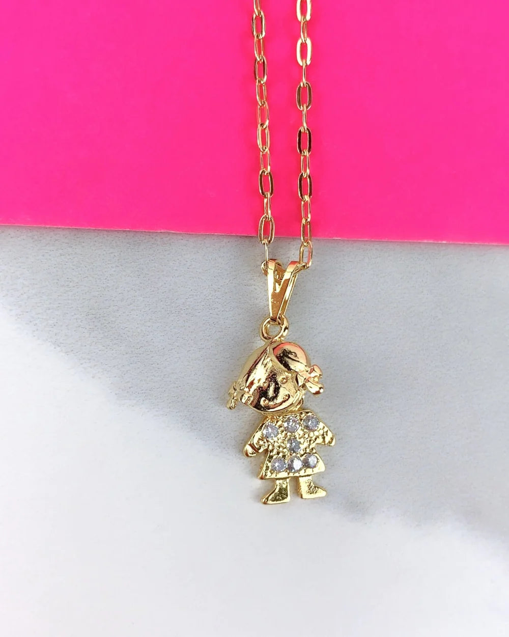 Chain and Pendant Set. Boy or Girl Gold Pendant with Cubic Zirconia Moving Head. Oval Link Chain with 18k Gold Filled. Bundle and Save. FREE SHIPPING on orders of $100 and over.  Sam's Jewelry World USA.