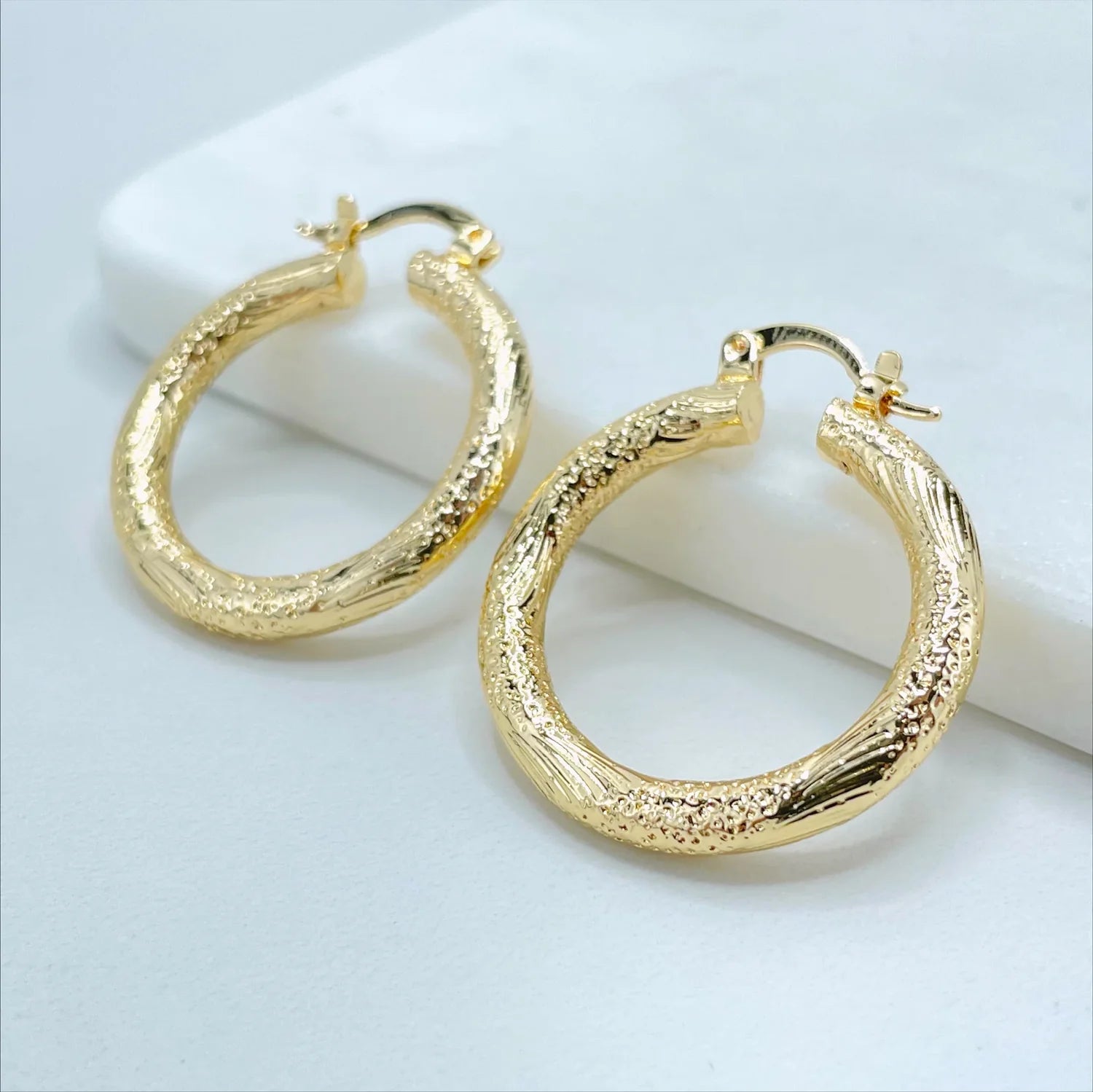 Earrings Hoop Texturized 18k Gold Filled. Bundle and Save. FREE SHIPPING on orders of $100 and over.  Sam's Jewelry World USA.