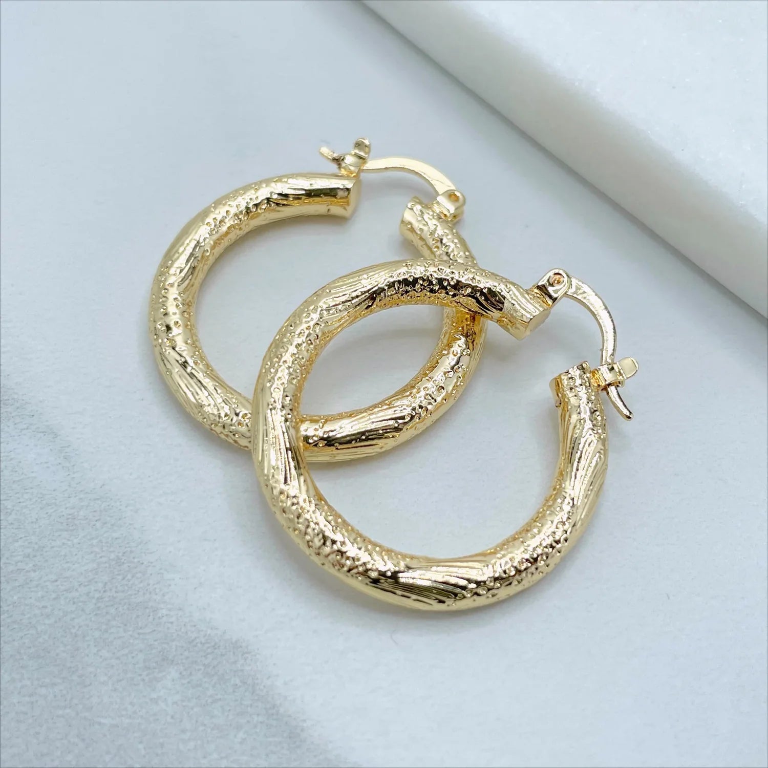 Earrings Hoop Texturized 18k Gold Filled. Bundle and Save. FREE SHIPPING on orders of $100 and over.  Sam's Jewelry World USA.