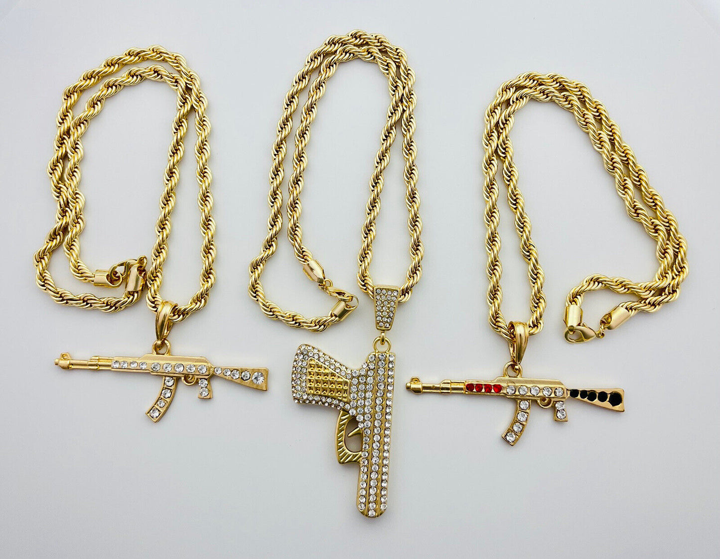 Chain and Pendant Set. Firearm and 6mm Rope Chain Set 18k Gold Filled. Bundle and Save. FREE SHIPPING on orders of $100 and over.  Sam's Jewelry World USA.